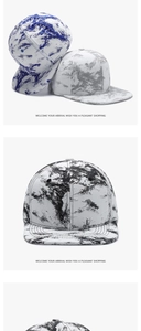 Detailed macro view of tie-dye marble print pattern on a flat brim hip hop baseball cap