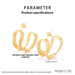 Detail view of gold-plated stainless steel hoop earrings with 23x15mm dimensions