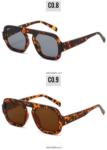 Detail view of bold tortoise shell and orange leopard pattern aviator sunglasses frames