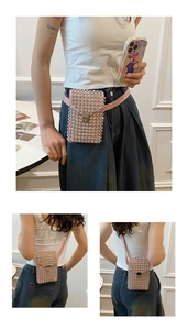 Detail of pink rhinestone crossbody bag showing gold lock and adjustable shoulder strap