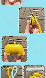 Detail view of the yellow leather car bag charm with black and white printed windows