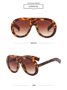 Detail view of leopard print aviator sunglasses with brown gradient lenses and C5 code