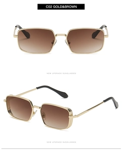 Detailansicht der goldenen eckigen Sonnenbrille mit braunem Verlauf und schwarzen Bügelenden