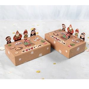 Detail of Christmas animal kraft gift boxes with 3D cartoon inserts and snowflake patterns