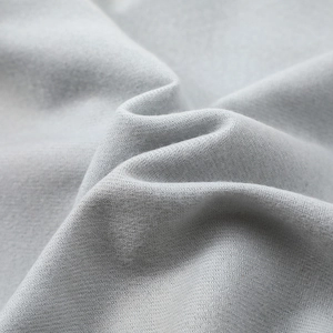 Close-up detail shot of soft grey cashmere imitation scarf fabric texture, warm winter wear.