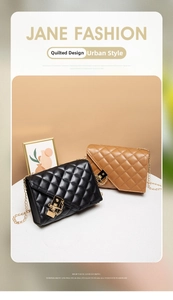 Detail of quilted leather bags in black and mocha brown with gold chain straps