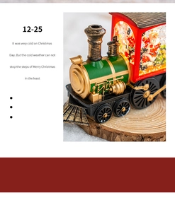 Christmas train snow globe detail view, vintage steam locomotive design with Santa inside.