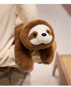 Detailed close-up of a plush brown sloth toy featuring soft long-pile fur and realistic claws