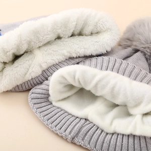 Winter kids knit hat set with thick fleece lining and faux fur pompom in grey color