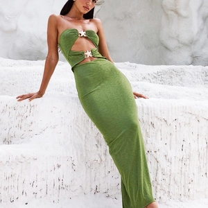 Sexy backless cut-out green tube maxi dress with starfish metal buckles on white rock