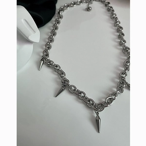 Unisex titanium steel chain necklace featuring four silver spike charms in a hip-hop style