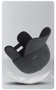 Detail of dark grey winter wool baseball cap with ear flaps and metal side accent