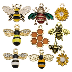 DIY enamel bee and sunflower charms set in gold alloy with crystals for jewelry making