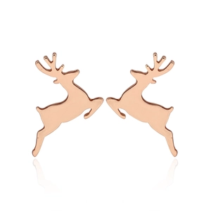 Detailed close-up of rose gold reindeer stud earrings with a polished reflective finish