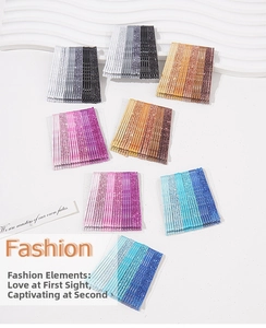 Close-up of glitter finish metal hair pins in various gradient colors on card