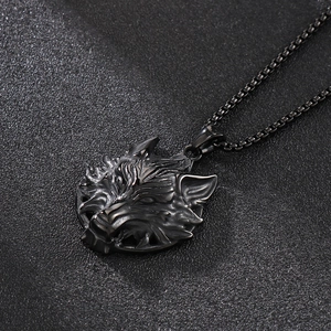 Detailed close-up of a 3D wolf head pendant with intricate fur texture and black box chain