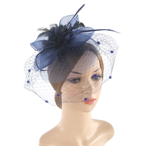 Navy blue vintage fascinator hat with elegant veil, feathers and floral accents
