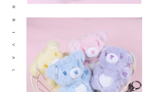 Detail of colorful plush heart bear keychains in soft macaron tones with metal hooks