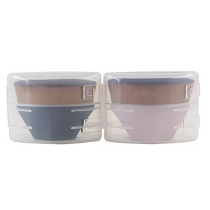 Detail view of pink and blue magic foundation brushes in transparent storage cases