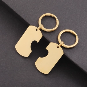 Matching gold-tone stainless steel heart puzzle keychains for couples and friends
