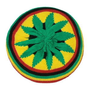 Detailed cable knit texture and Rasta leaf pattern on top of crochet beanie hat