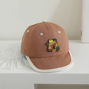 Adorable brown capybara baby baseball cap with soft brim and cute propeller detail