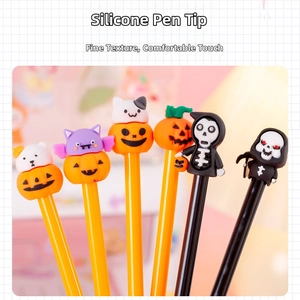 Close-up of Halloween gel pens with silicone pumpkin, ghost and bat toppers