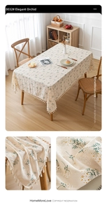 Detail shot of pastoral floral linen tablecloth with elegant tassels and daisy pattern