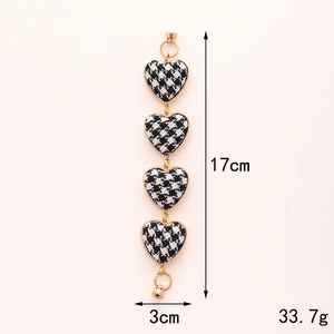 Fashionable houndstooth heart charm bracelet with gold metal trim and zinc alloy clasp