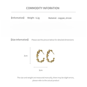 Detailed technical spec sheet for gold C-shaped earrings with zircon stars and size guide