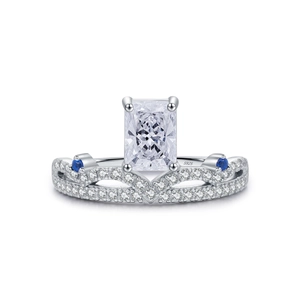 Sparkling S925 silver crown ring with large rectangular center stone and blue side accents