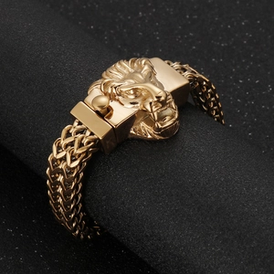 Bracelet pour homme en acier titane avec tête de lion dorée et chaîne à double rangée