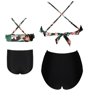 Family matching two-piece bikini set with tropical floral print and high-waisted black bottoms