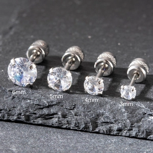 Set of 4 stainless steel stud earrings with zircons in sizes 3mm to 6mm with screw backs