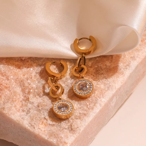 Elegant gold plated heart drop earrings with round diamond accents on pink stone