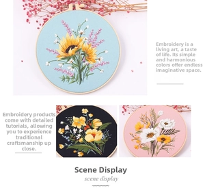 Detail view of sunflower embroidery kit with wooden hoop and colorful floral patterns