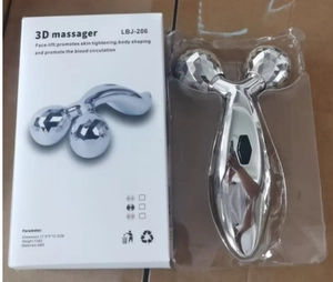 Close-up of the 3D roller massager with its retail packaging box on a wooden surface