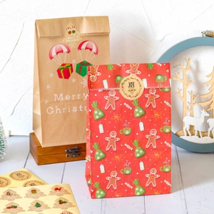 Christmas kraft gift bags with Merry Christmas designs and matching round stickers