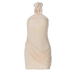 Detail view of beige halter dress neck knot and elegant ruched fabric texture on a white background