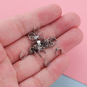 3x7mm stainless steel silver pendant bails connectors held in hand for DIY jewelry making