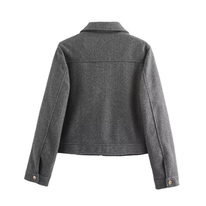Rear view of cropped dark grey jacket showing thick wool-like texture on white background
