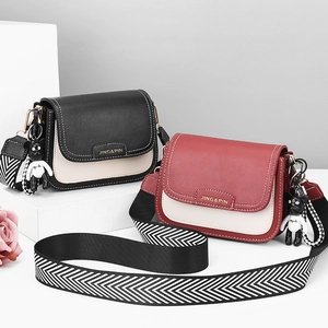 Chic women's crossbody bag in black and beige PU leather with stylish striped wide strap