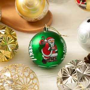 Macro view of 8cm Christmas ornaments with green Santa patterns and geometric facets