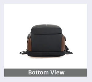 Detail of crossbody bag reinforced bottom featuring waterproof fabric and leather trim