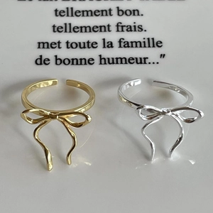 Elegant silver and gold bow rings set with adjustable open band for women