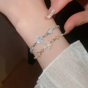 French palace style flower bracelets in gold and silver finish with sparkling zircons