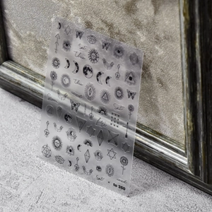 Bohemian celestial nail stickers featuring moon phases and stars on a vintage background