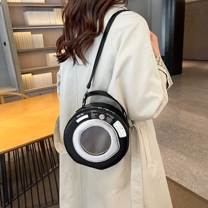 Unique black round crossbody bag with creative washing machine dial print design