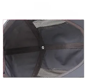 Detailed close-up of dark gray breathable mesh lining and reinforced metal rivets on the cap