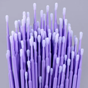 Purple disposable micro brushes for eyelash extensions and precision makeup cleaning